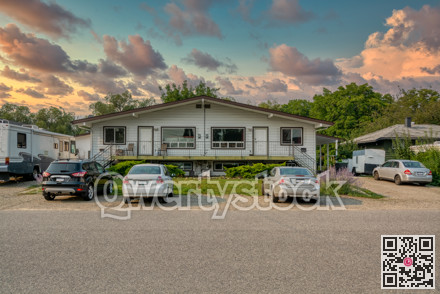 Duplex residential building rented to two tenants with families