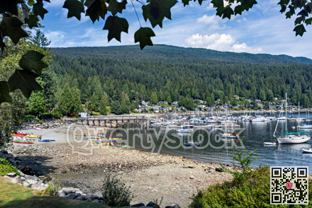 Deep Cove bay area with yacht on the water