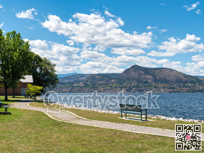 Scenery Okanagan lake overview with the bench at the waterfront