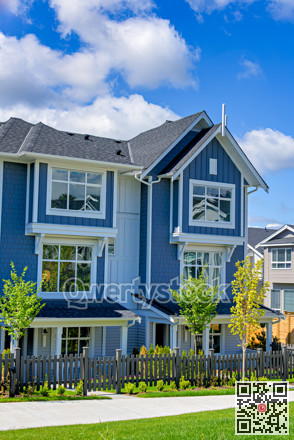 New residential townhouse on bright sunny day