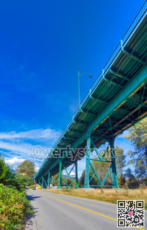 Lion Gates bridge over the asphalt road in West Vancouver