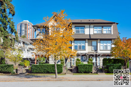 Residential apartment buildings on blue sky background