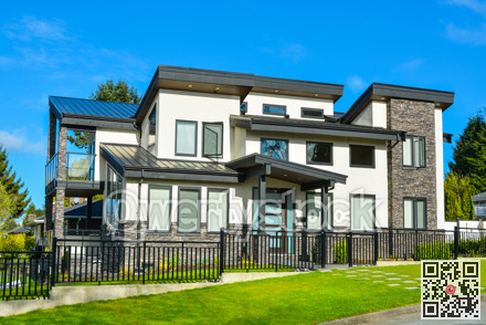 New residential house with concrete tile pathway over front lawn