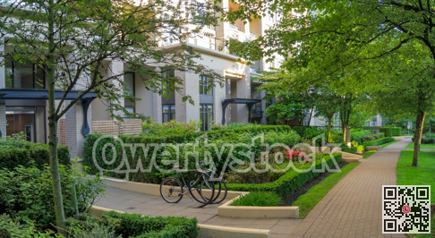 Shadowed passway along the residential building on summer evening time