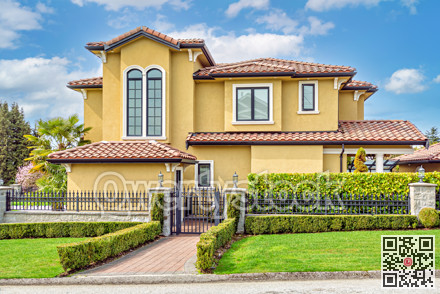 Luxury family house on cloudy sky background