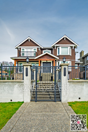 Luxury residential houses with landscaped front yard on land terrace