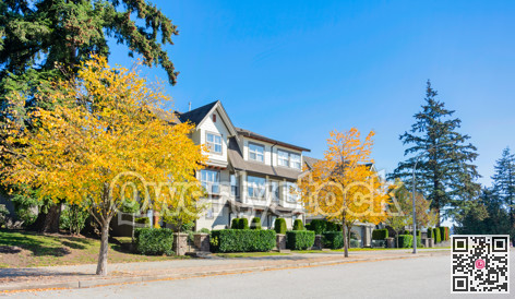 Residential apartment buildings on blue sky background
