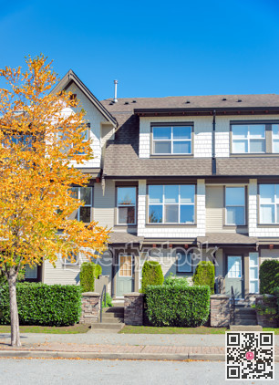 Residential apartment buildings on blue sky background