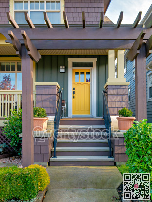 A perfect neighbourhood. Porch and entrance of a nice residential house