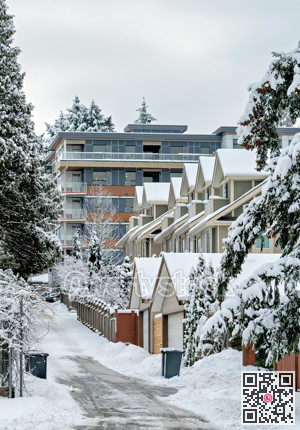 Back street of residential townhouses on winter season