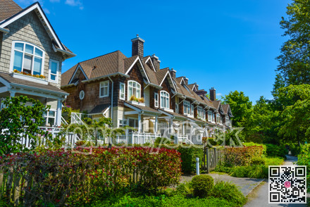 Residential townhouses on sunny day in Vancouver, British Columbia, Canada.