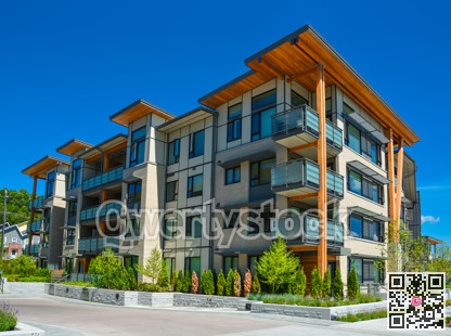 Brand new apartment building on sunny day in British Columbia, Canada.