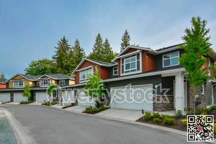 Street of brand new residential triplex houses ready for moving in