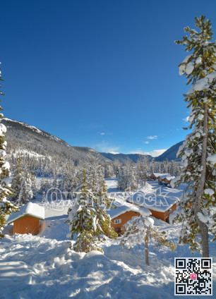 Row of houses in snow in Manning Park, BC.