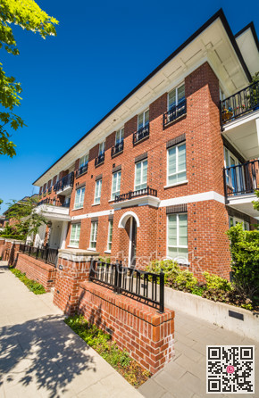 Brand new apartment building on sunny day in British Columbia, Canada.