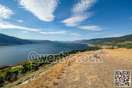 Magnificent view over Okanagan lake and valley with bizarre clouds in the sky