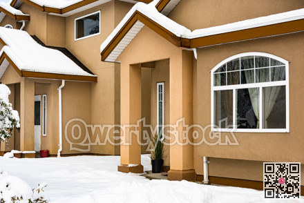 Facade of residential house on winter season in Canada.