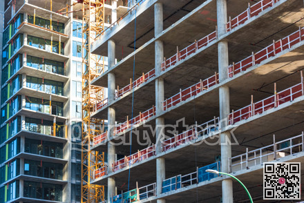 New multi-storey buildings under constraction close up.