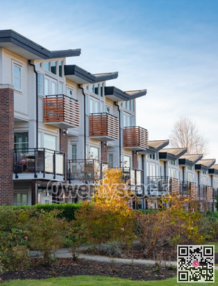 Row of residential townhouses on winter day in British Columbia.