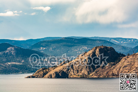 Scenery view of rocky slope over the lake in British Columbia.