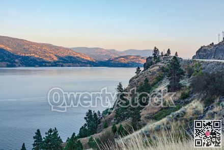 Scenery overview of Okanagan lake on summer sunset