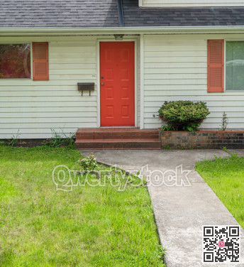 Old house main entrance with red door