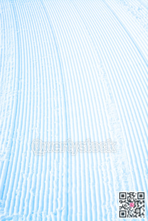 Stripes on snow surface profiled for future ski trace.