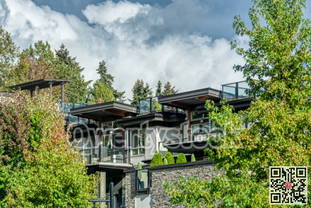 Top of residential building on hovering clouds background