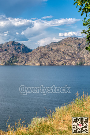 Beautiful overview of the lake and rocky mountains in British Columbia.