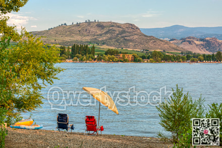 Small tourist camp with a lake overview on warm summer evening.