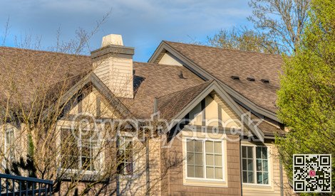 Top of residential building in light of golden sunset