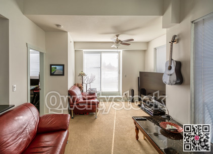 Living room interior with red sofas big screen and guitar on the wall