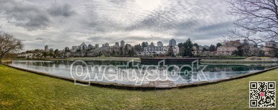 Panoramic overview of Vancouver from Granville Island on cloudy day