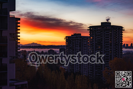 Early morning in a city. Dawn coming from the East