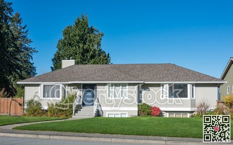Family house on bright sunny day on blue sky background