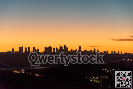 Cityscape on sunset with clear sky background closer to the night