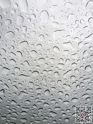 Abstract texture of water drops on a glass