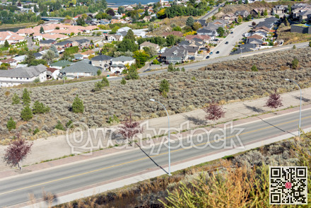 Overview of a cityscape with highway on autumn evening time