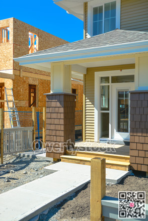 Entrance door of brand new family townhouses on construction completion stage.