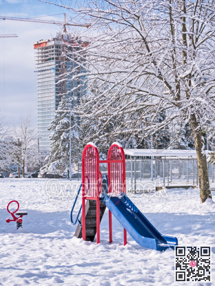 Children's play ground in snow on winter season in Canada