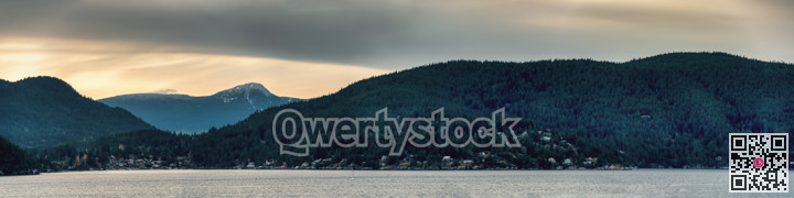Ocean bay panoramic landscape with residential houses on the shore