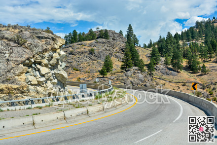 Tight turn on mountain road in Okanagan valley, British Columbia.
