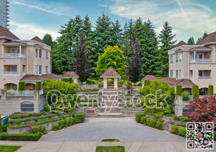 Italian style low-rise residential building with concrete stairs to land terrace