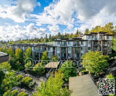 Panoramic veiw of residential building on cloudy sky background