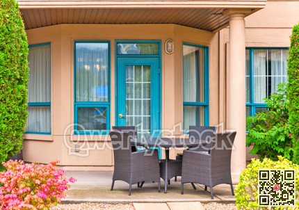 Outdoor table with four chairs on residential patio
