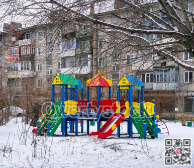 Colorful playground in snow on winter season
