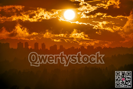 Urban cityscape silhouette on sunset sky background
