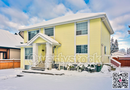 Yellow residential house on winter season in Vancouver, Canada