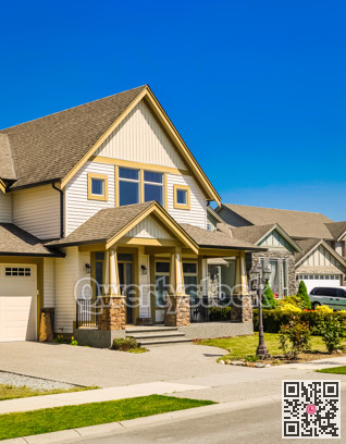 Big family house with concrete driveway to the garage