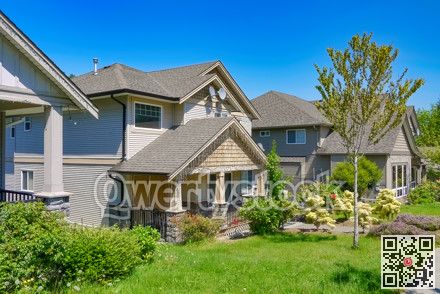 North American residential houses on the street with blue sky background
